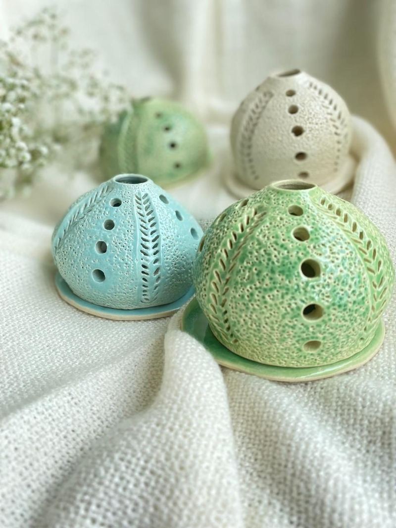 Handmade ceramic lanterns by Mudcast Pottery