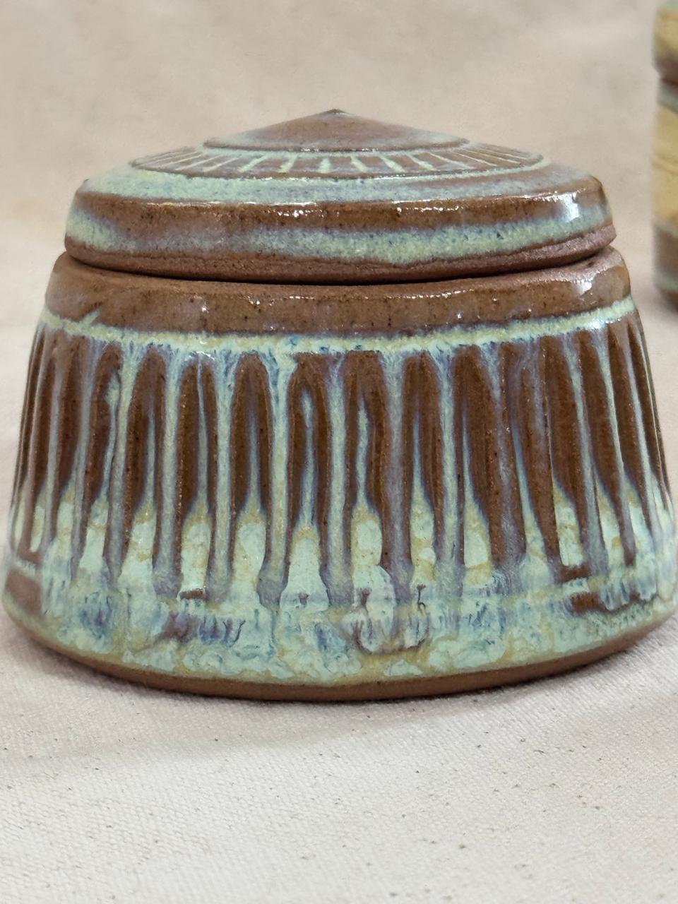 Lidded jar with carved pattern and teal glaze — Meeta Pant