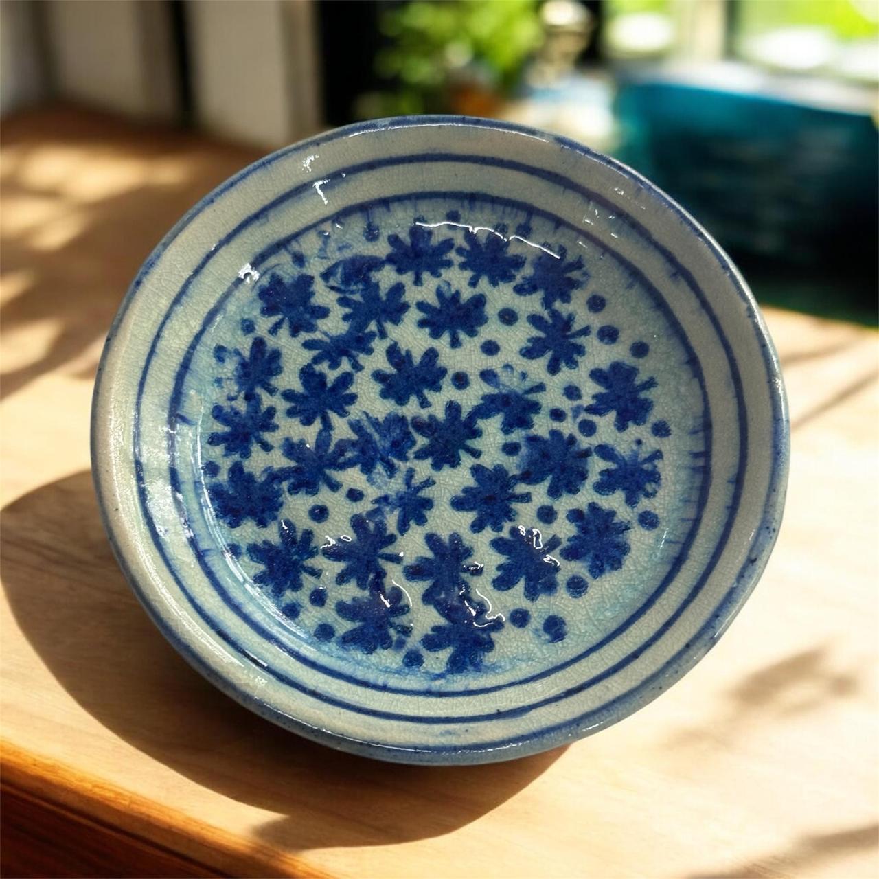 Hand-painted ceramic plate by Meeta
